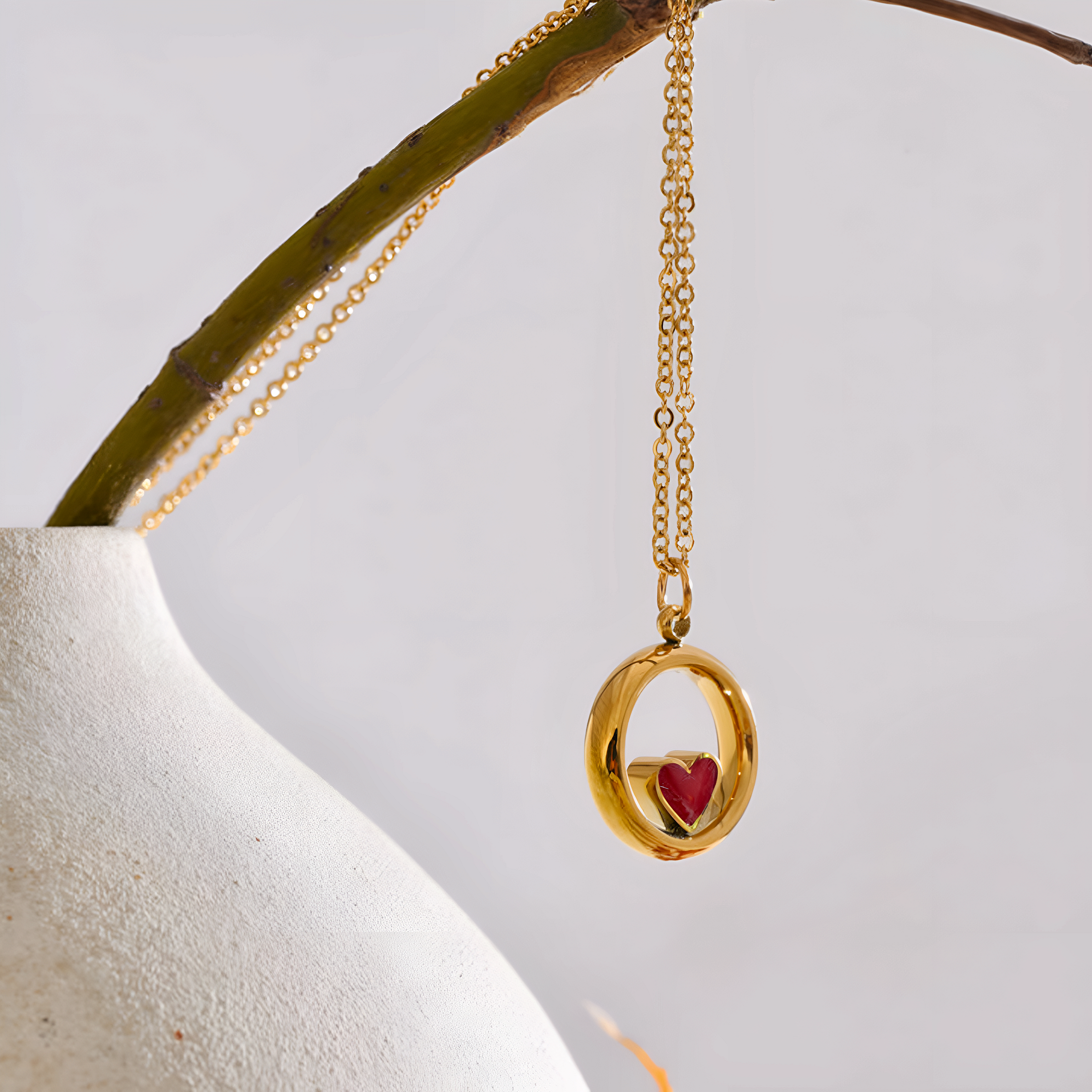 Collar dorado Vértice con cubic zirconia en acero inoxidable